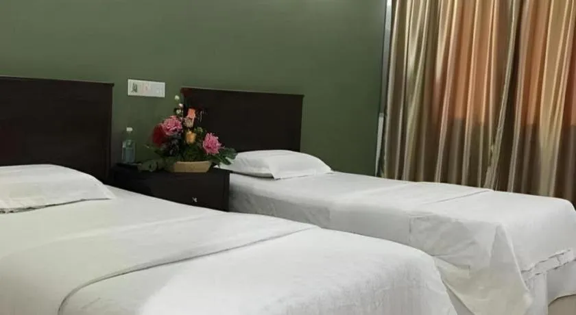 Bed in Loong Fatt Hotel