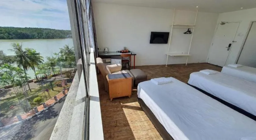 Bed in Riverine Garden Hotel