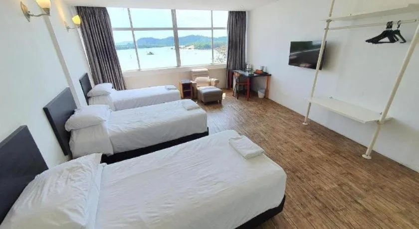 Bed in Riverine Garden Hotel