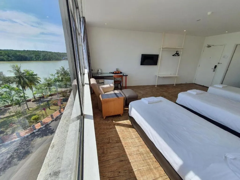 Bed in Riverine Garden Hotel