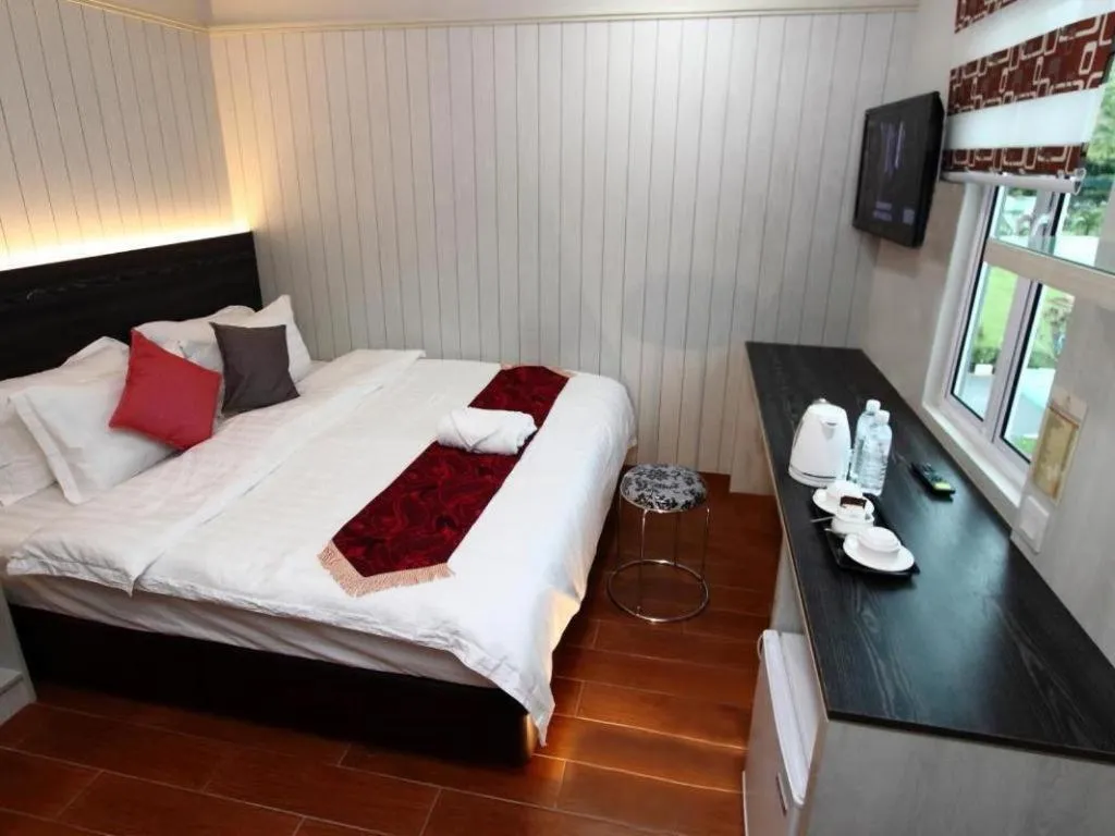 Bed in Grand SH Hotel