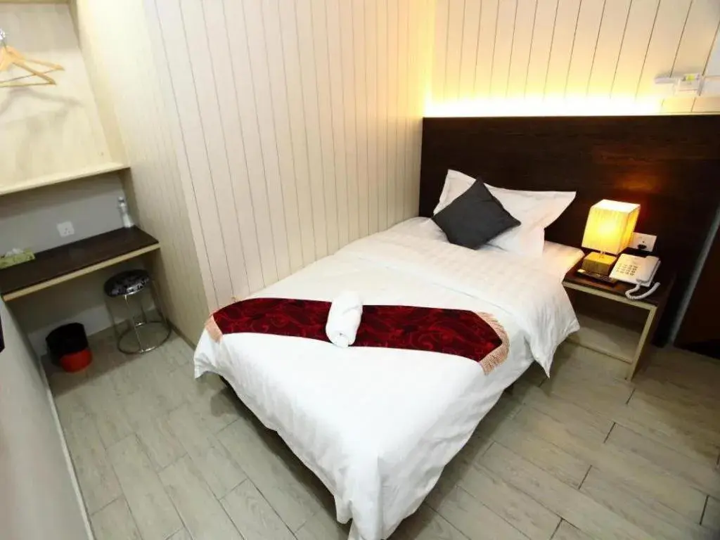 Bed in Grand SH Hotel Bed in Grand SH Hotel