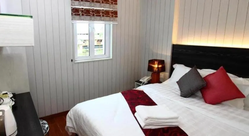 Bed in Grand SH Hotel