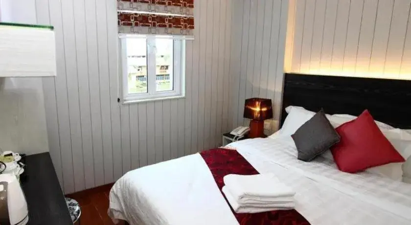 Bed in Grand SH Hotel Bed in Grand SH Hotel