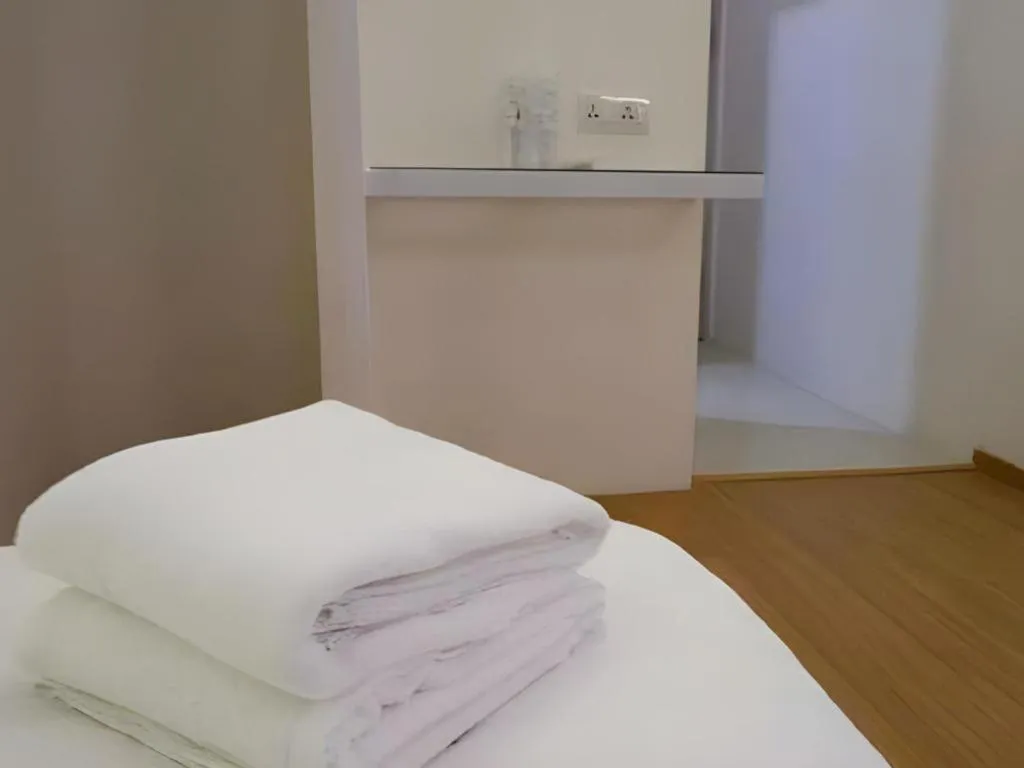 Bed in Place2Stay Business Hotel @ Waterfront