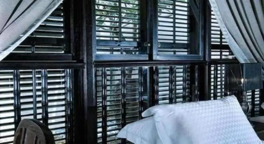 Bed in Courtyard at Heeren Boutique Hotel