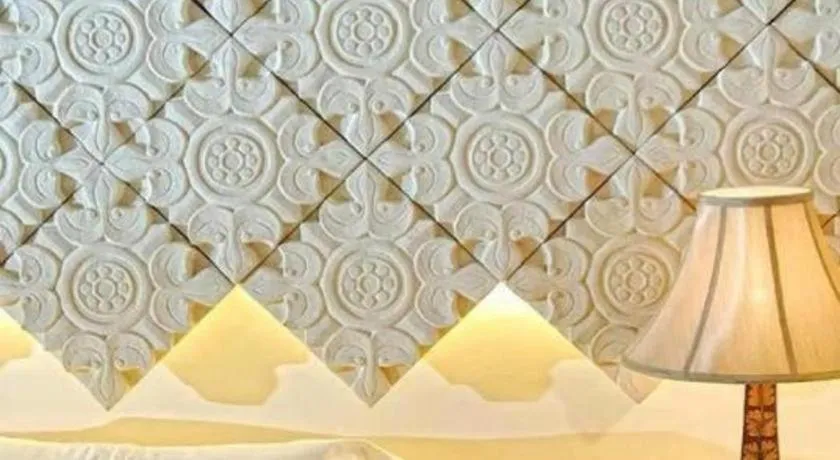 Bed in Courtyard at Heeren Boutique Hotel