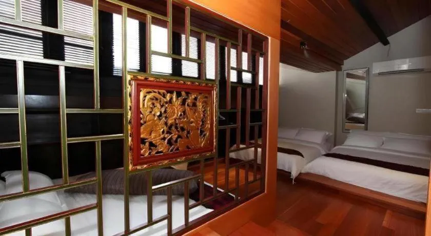 Bed in Courtyard at Heeren Boutique Hotel