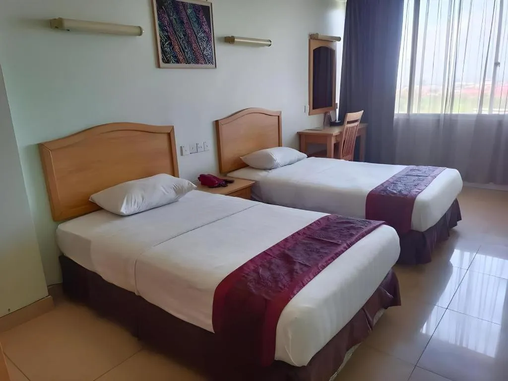 Bed in Li Hua Hotel Bintulu