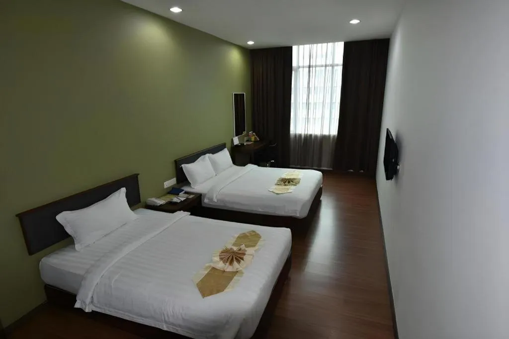 Bed in Li Hua Hotel Bintulu