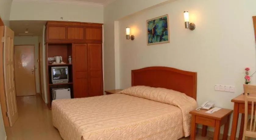 Bed in Li Hua Hotel Bintulu