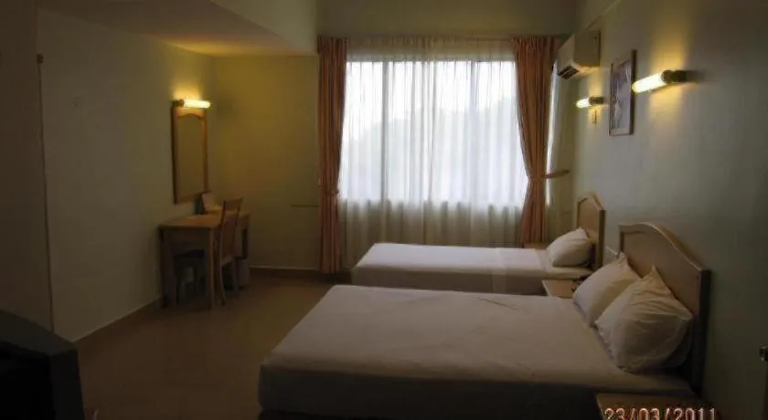 Bed in Li Hua Hotel Bintulu