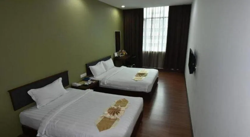 Bed in Li Hua Hotel Bintulu