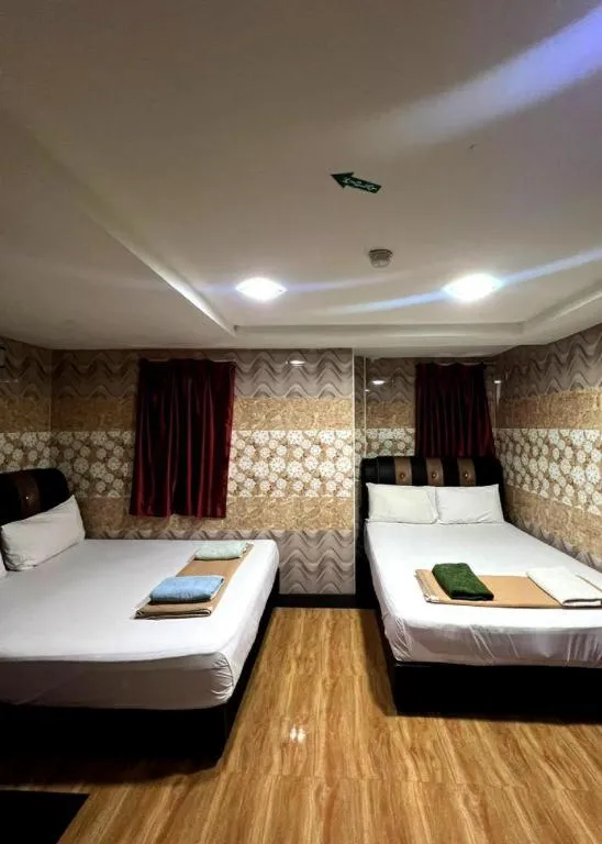 Bed in Putra Heights New Wave Hotel