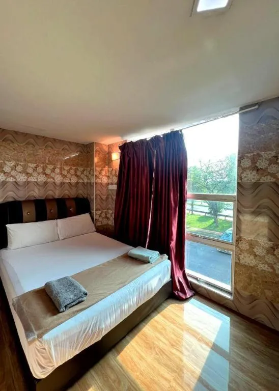 Bed in Putra Heights New Wave Hotel