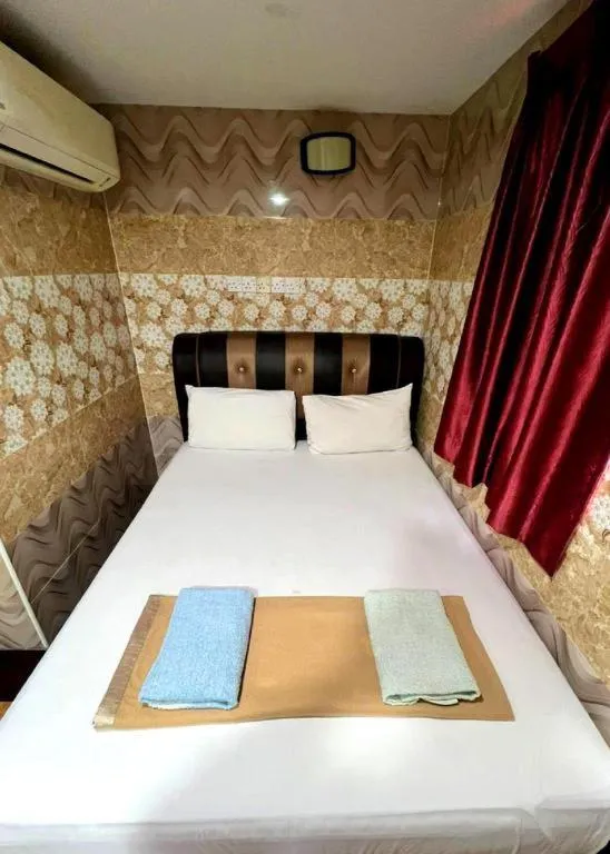 Bed in Putra Heights New Wave Hotel