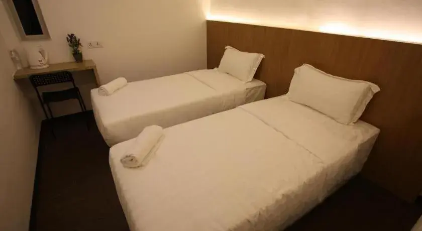 Bed in Place2Stay Business Hotel @ Metrocity Bed in Place2Stay Business Hotel @ Metrocity