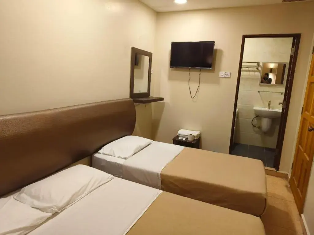 Bed in The Pines Hotel Bed in The Pines Hotel