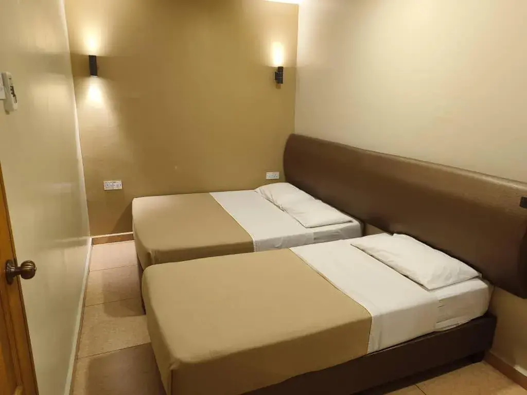 Bed in The Pines Hotel Bed in The Pines Hotel