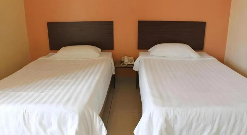 Bed in THE GARDEN HOTEL (BANTING) SDN. BHD.