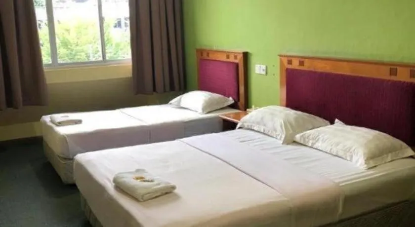 Bed in Hotel Perdana