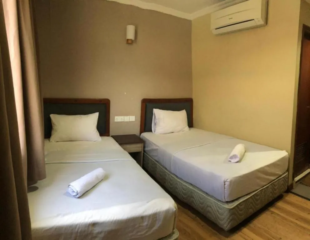 Bed in Hotel Perdana