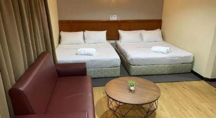 Bed in Hotel Perdana