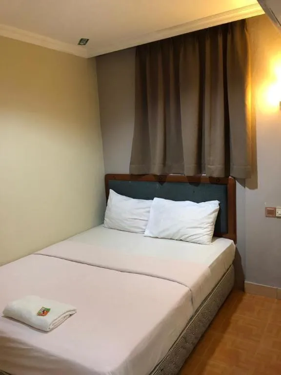 Bed in Hotel Perdana