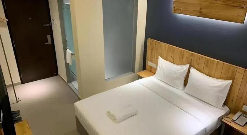 Bed in TLJ HOTEL Bed in TLJ HOTEL