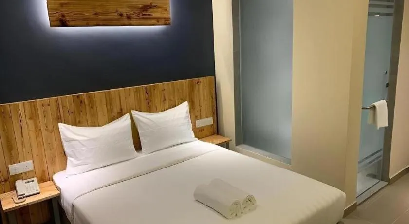 Bed in TLJ HOTEL