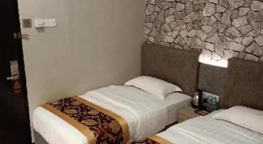 Bed in M GLOBAL HOTEL Bed in M GLOBAL HOTEL