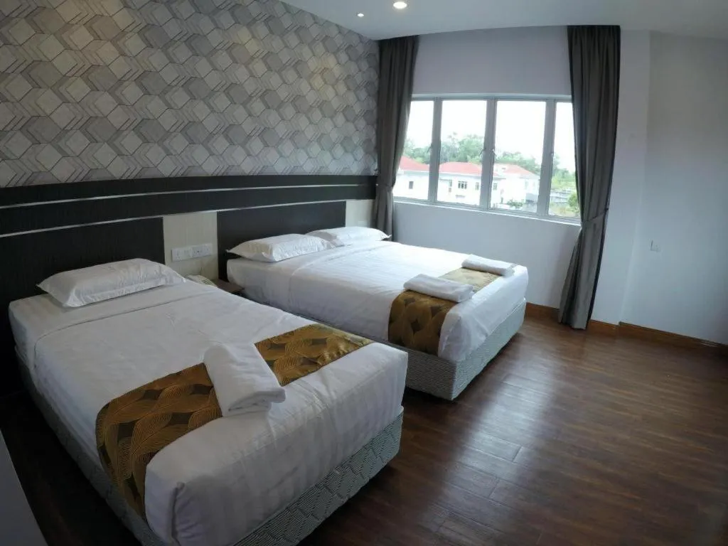 Bed in HOTEL KAWAN BIDOR