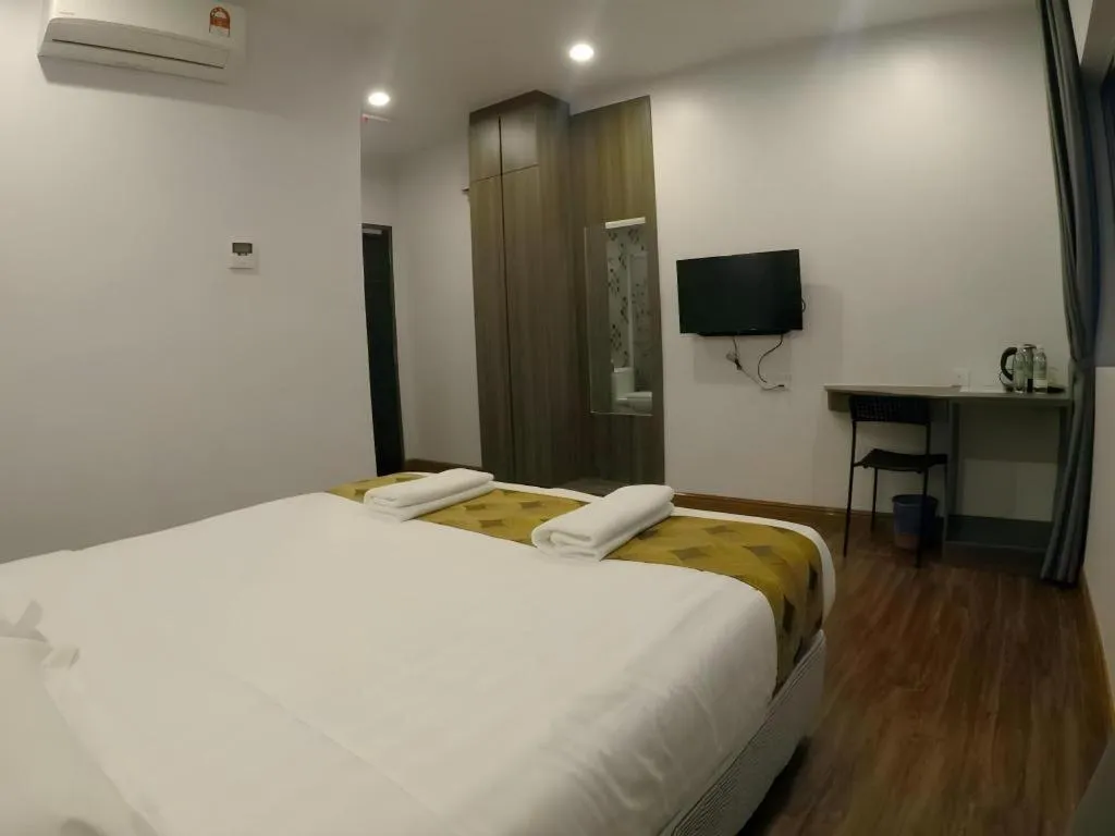 Bed in HOTEL KAWAN BIDOR