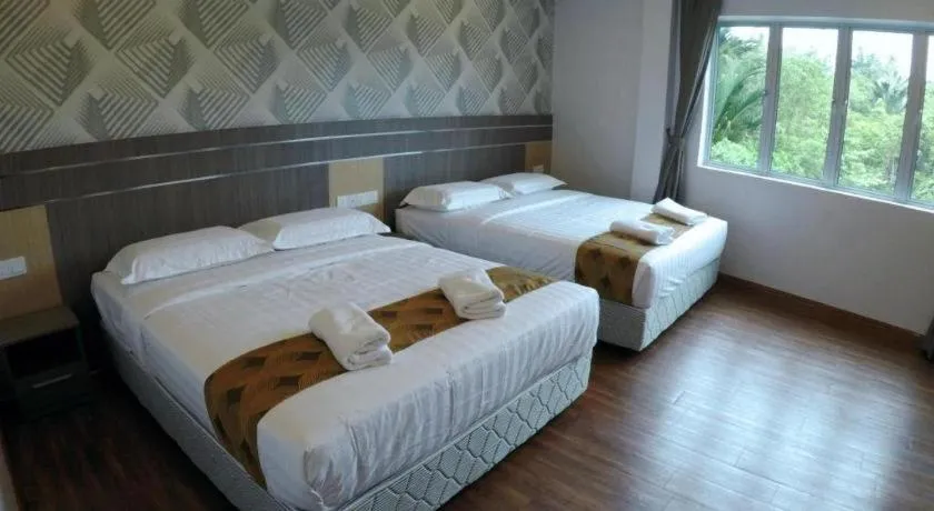 Bed in HOTEL KAWAN BIDOR