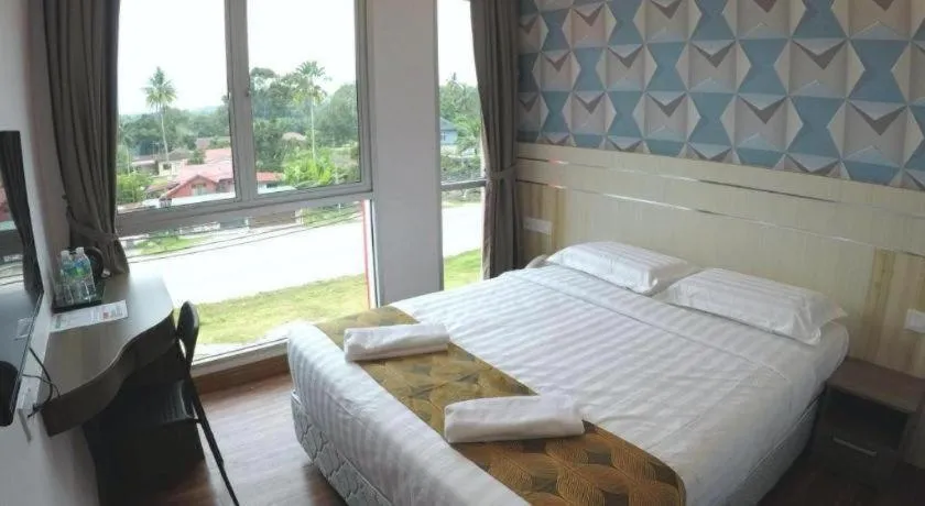 Bed in HOTEL KAWAN BIDOR