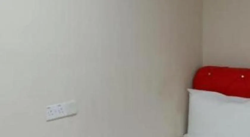 Bed in GEORGETOWN @ NEW WAVE HOTEL