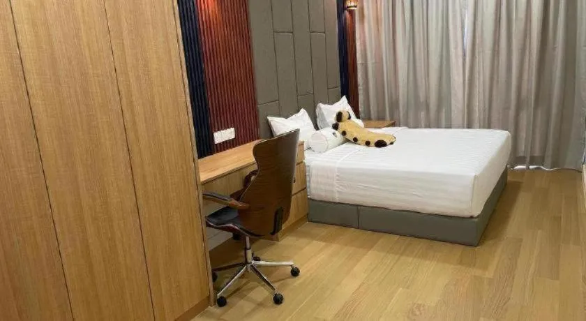 Bed in Sentral Suites By Eassy Hotel