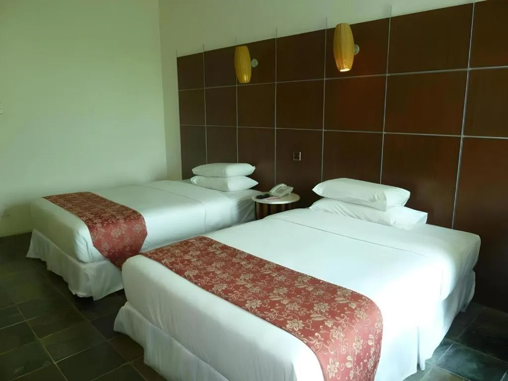 Bed in Century Helang Hotel