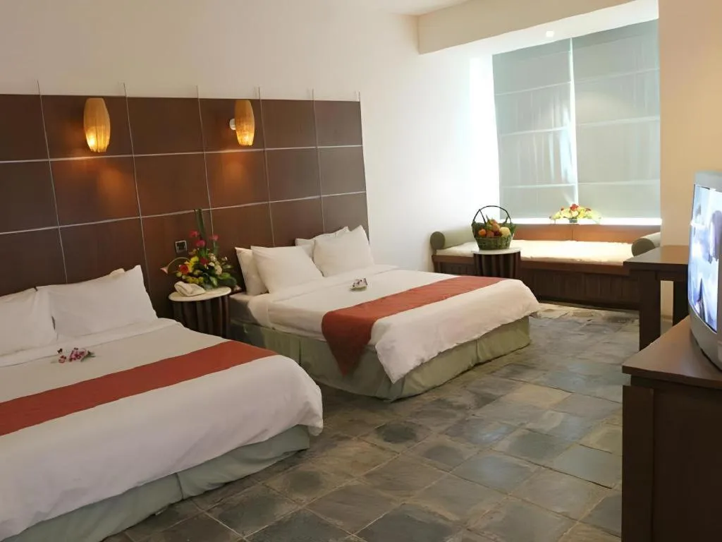 Bed in Century Helang Hotel