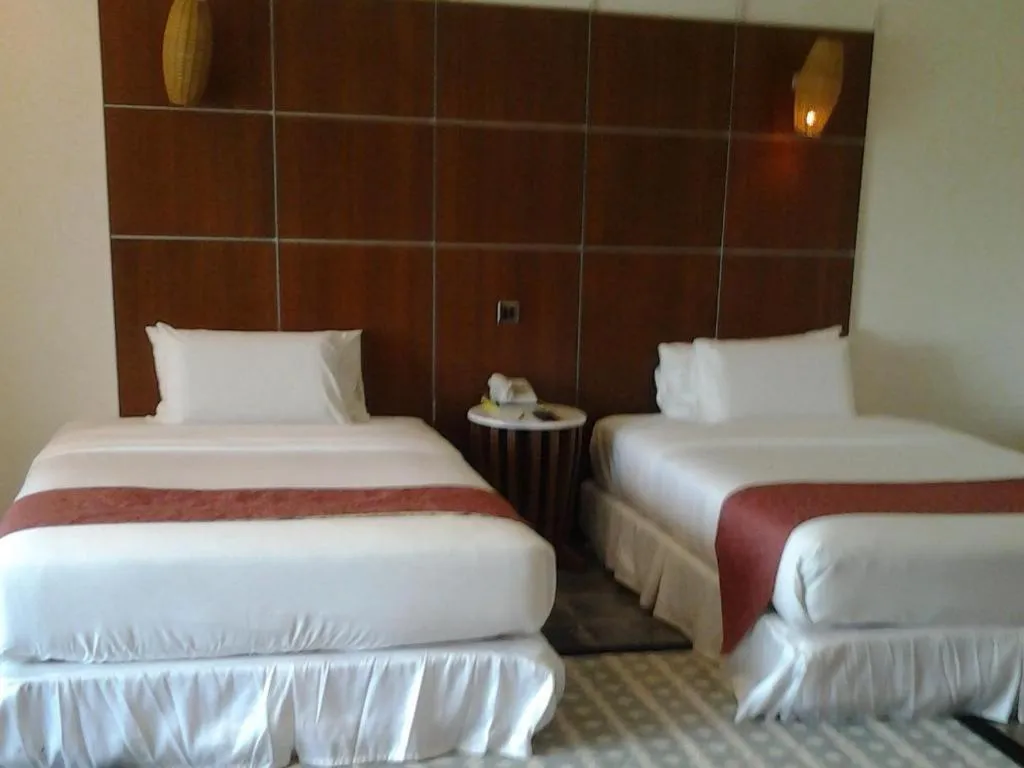 Bed in Century Helang Hotel