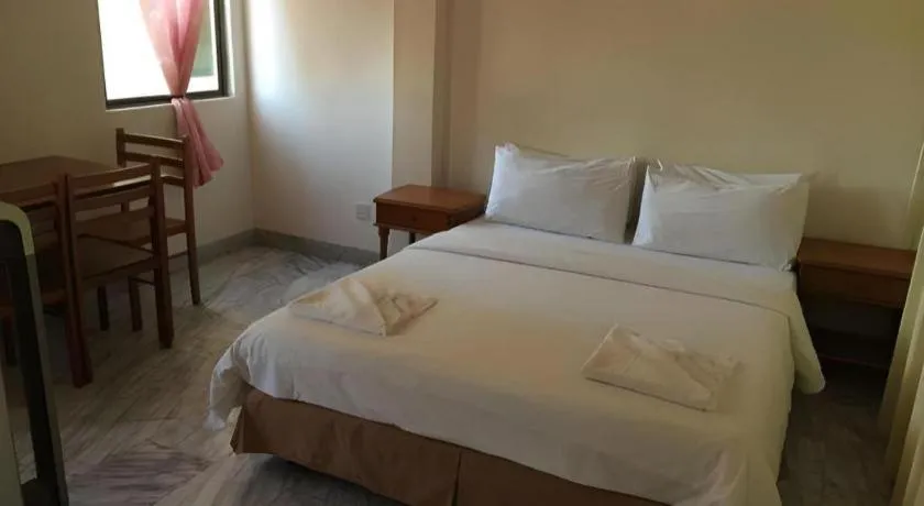 Bed in Seapark Condotel Hotel