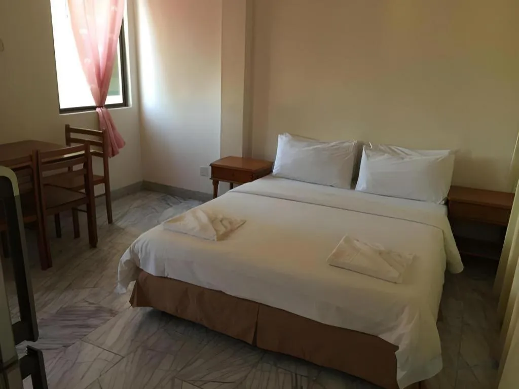 Bed in Seapark Condotel Hotel