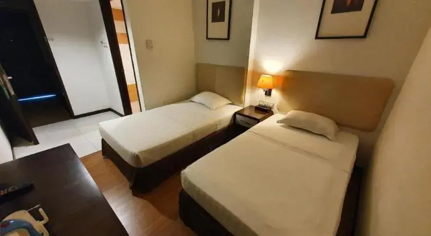 Bed in Ritz Garden Hotel Bed in Ritz Garden Hotel