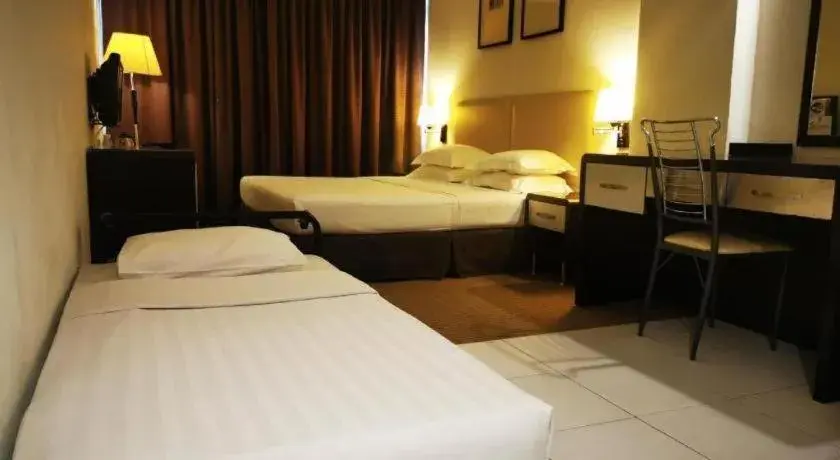 Bed in Ritz Garden Hotel Bed in Ritz Garden Hotel