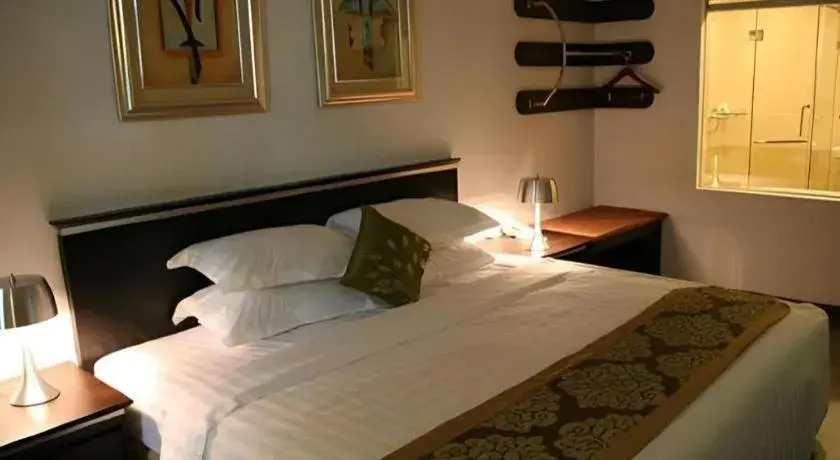 Bed in Ritz Garden Hotel Bed in Ritz Garden Hotel