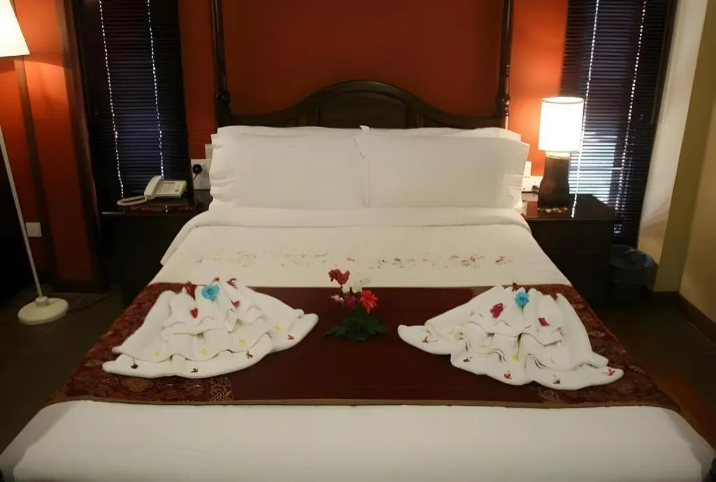 Bed in Anggun Boutique Hotel