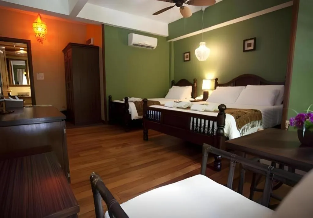 Bed in Anggun Boutique Hotel