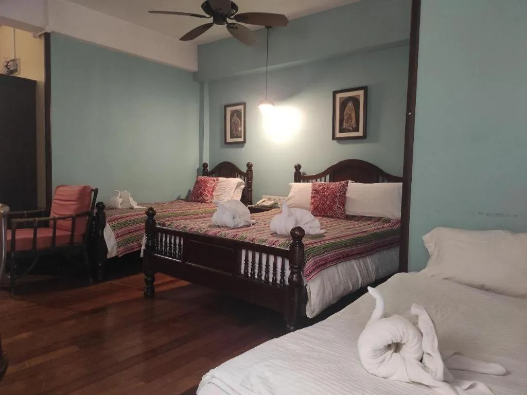 Bed in Anggun Boutique Hotel