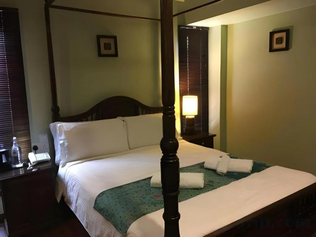 Bed in Anggun Boutique Hotel
