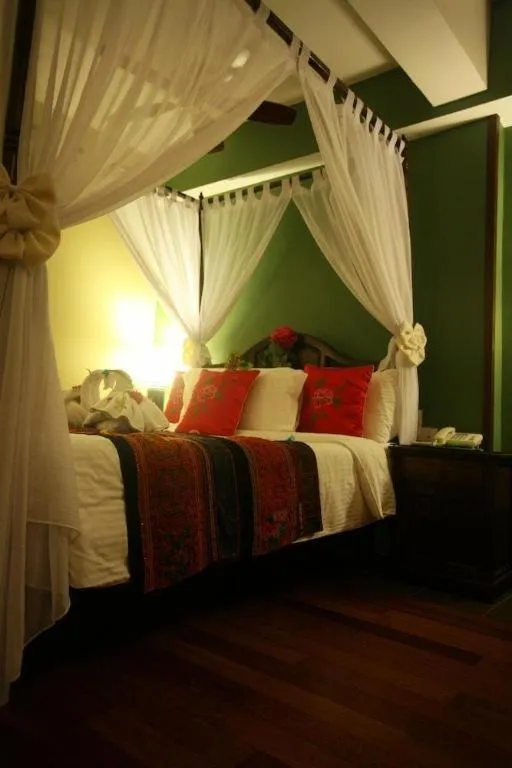 Bed in Anggun Boutique Hotel